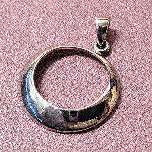 Silver circle pendant